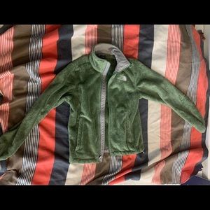 Green furry north face jacket